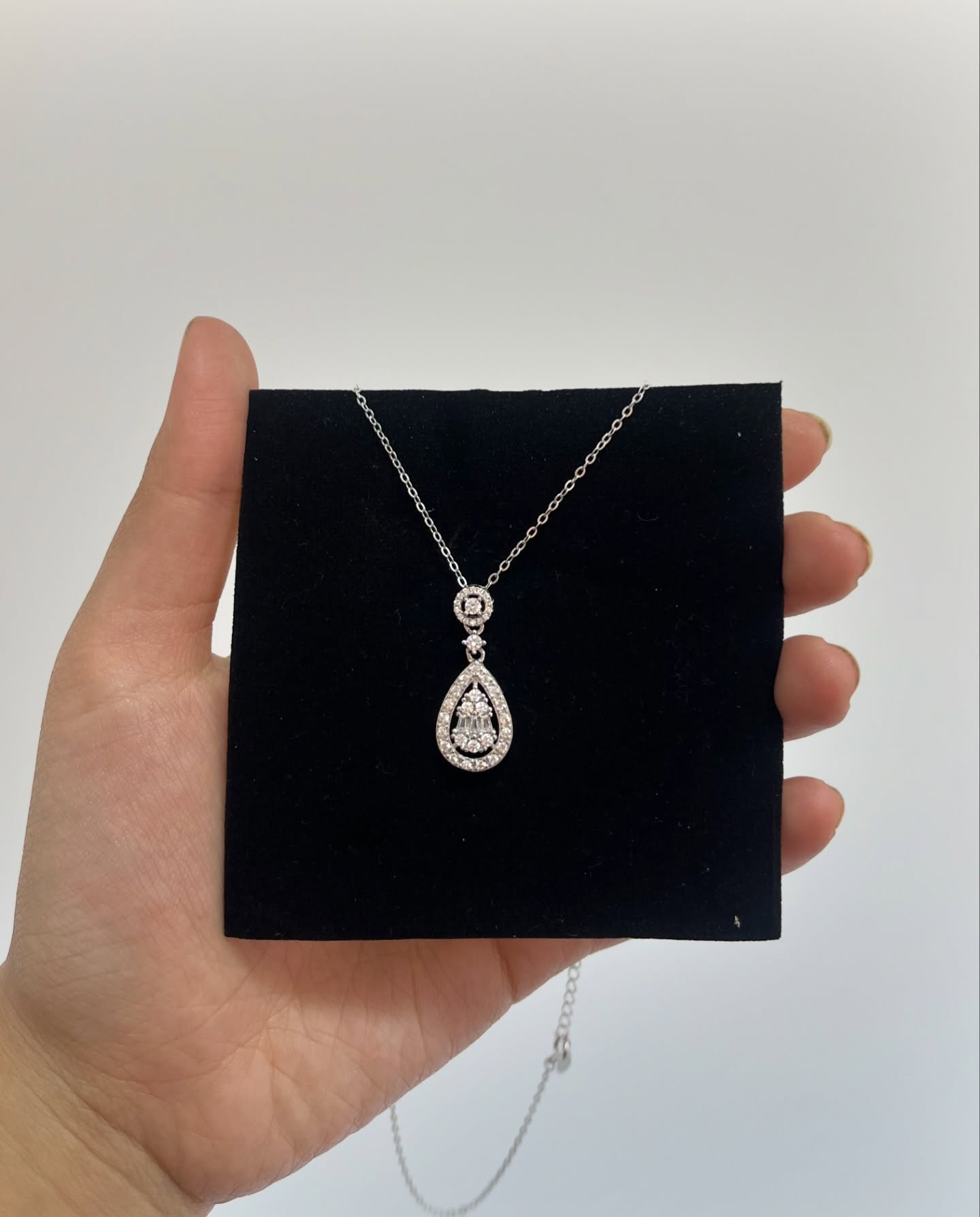 Silver lockets that are treasures of the heart worn with grace. - View 1