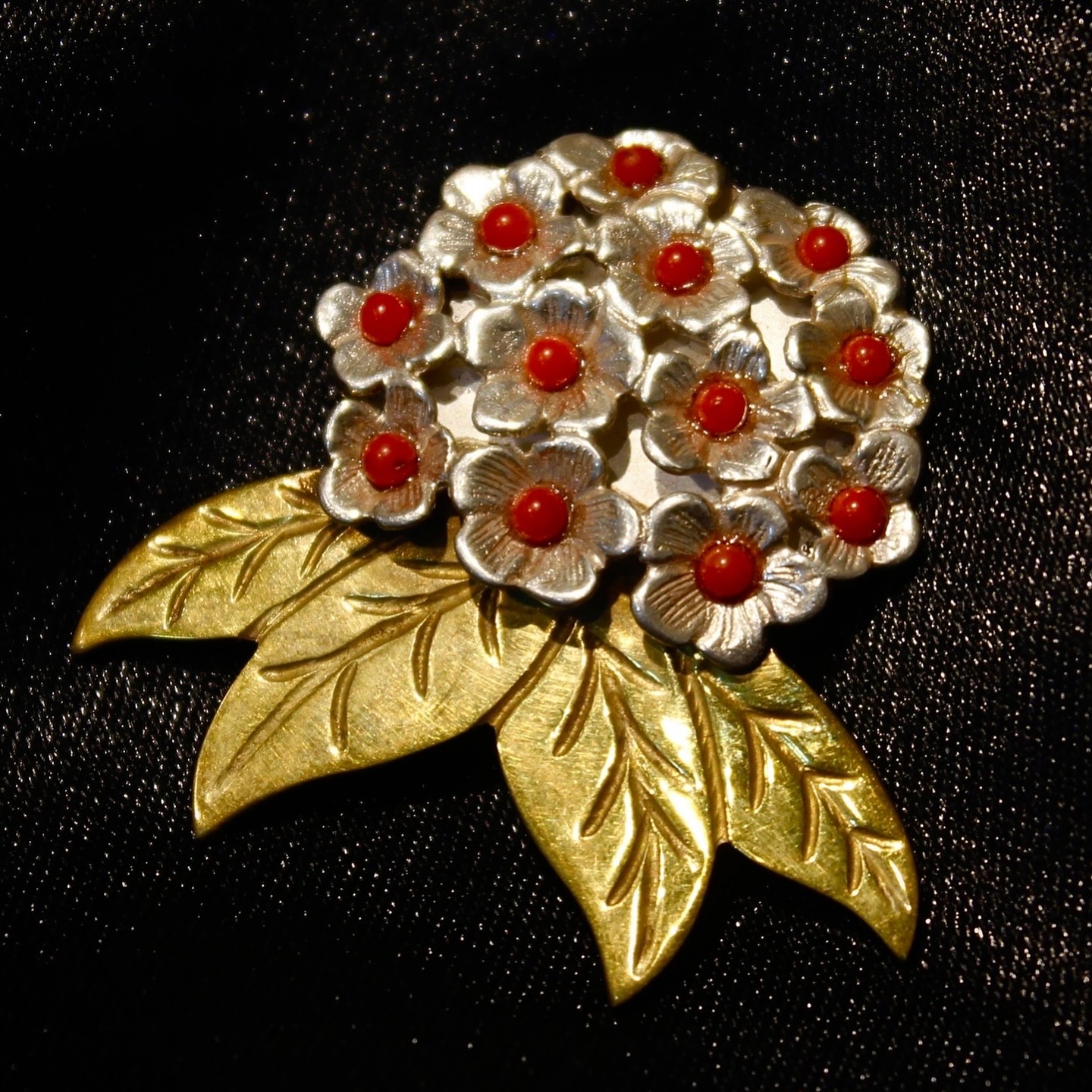 The Laliguras rhododendron symbol of resilience and beauty now in a stunning silver and gold-plate - View 1