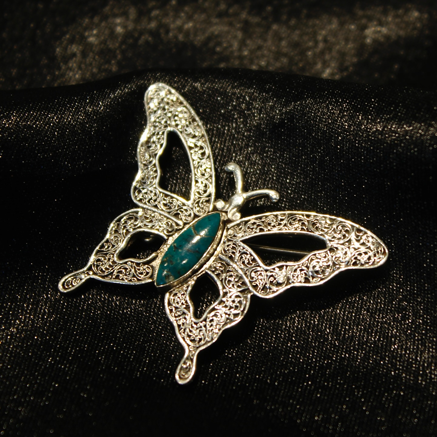 Designed with precision and care this silver butterfly brooch features elaborate details that bring - View 1