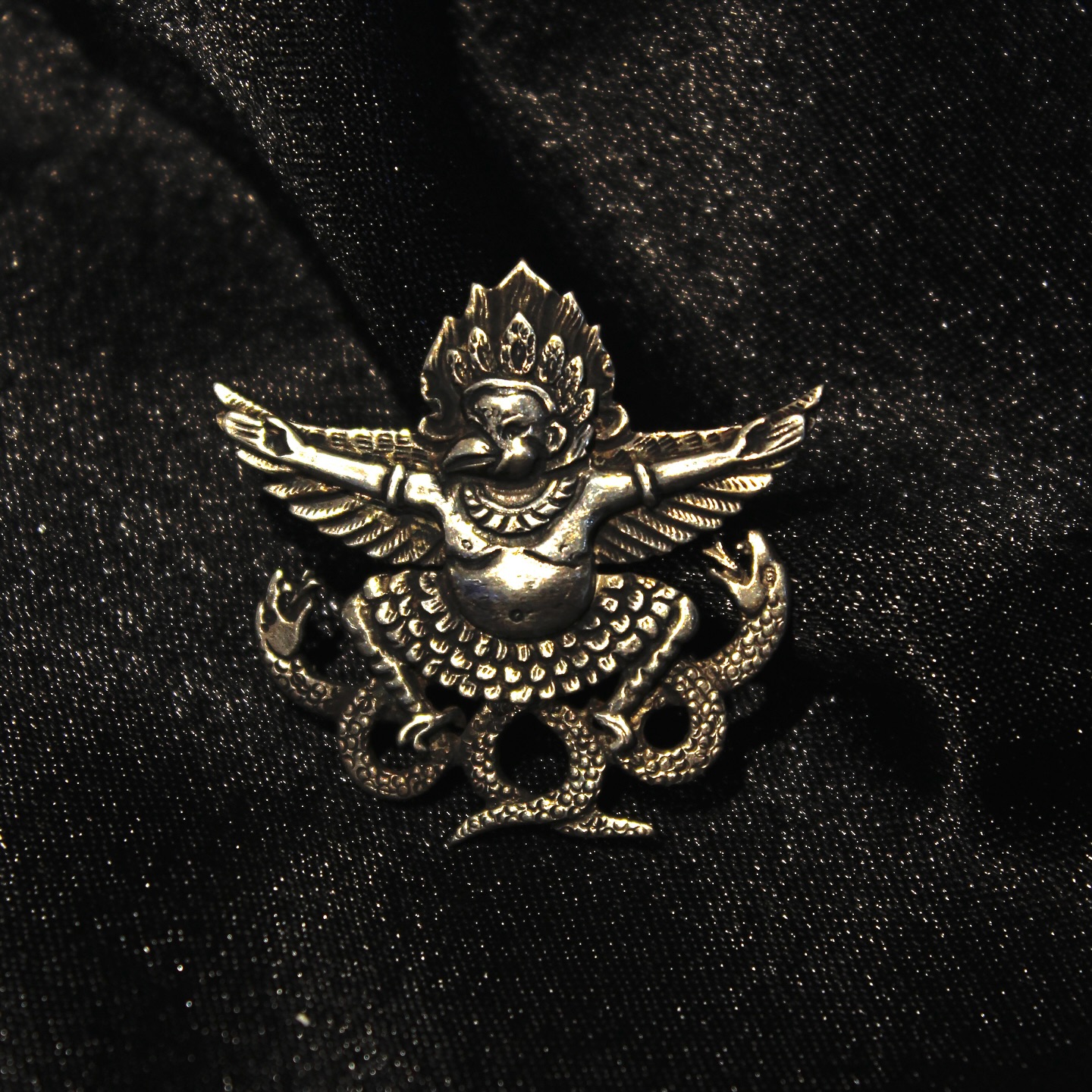 Inspired by mythology this silver brooch embodies Garudas role as the protector and vehicle of Vis - View 1