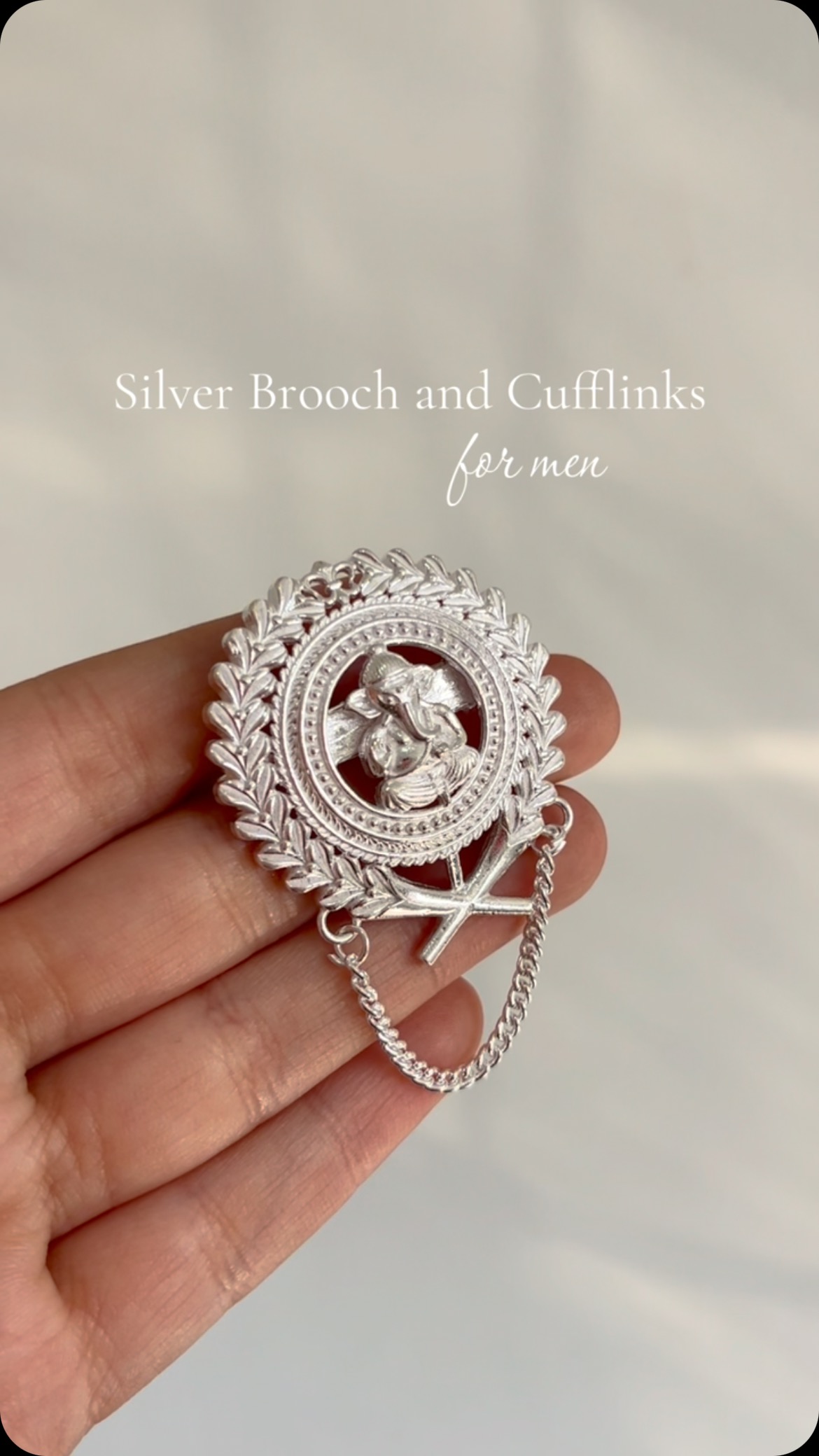 Elevate your style with the perfect pairing a silver brooch and matching cufflinks. - View 1