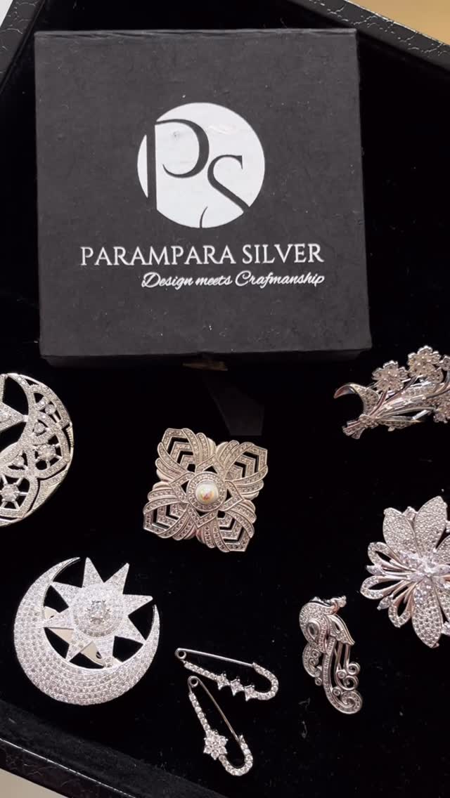 Shining as bright as her love a SILVER BROOCH for the heart that holds us all together. - View 1